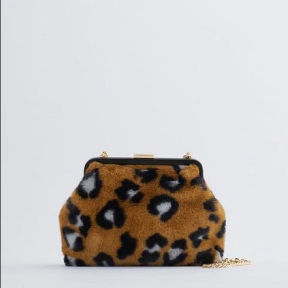 Faux fur clutch/crossbody bag. Brand new without tags.$25 each